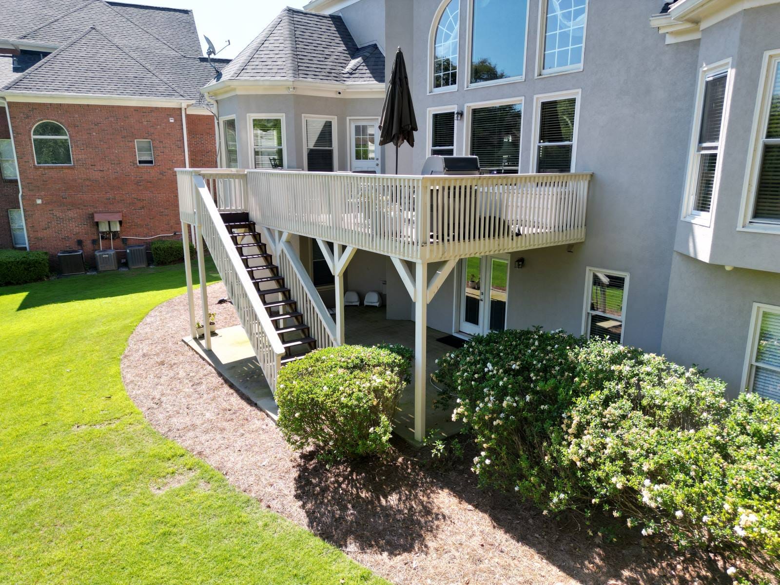 white backyard raised deck